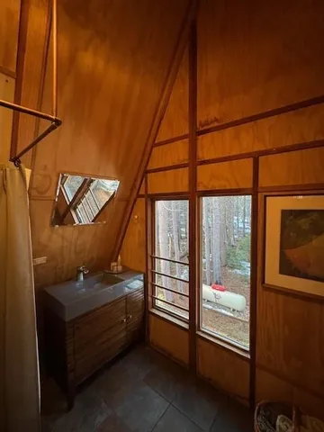 a room with furniture and a window