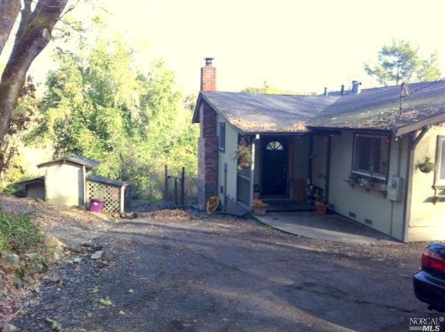 2834 Hidden Acres Road Santa Rosa, CA 95404 - Photo 1 of 1 a view of a house with a yard and garage