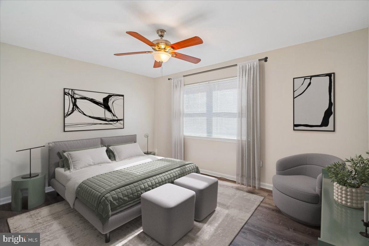 1891 Addison Road South District Heights, MD 20747 - Photo 12 of 21 Primary bedroom virtually staged.