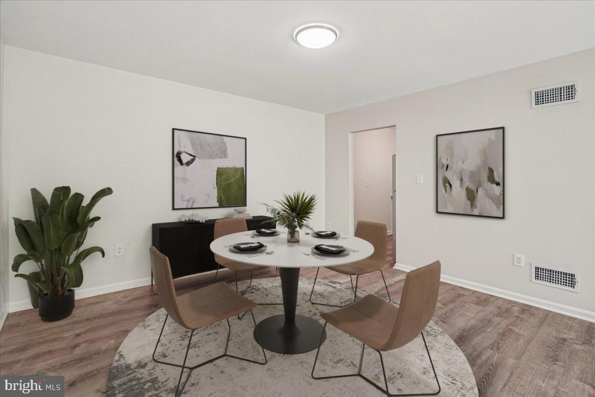 1891 Addison Road South District Heights, MD 20747 - Photo 5 of 21 Dining room virtually staged.