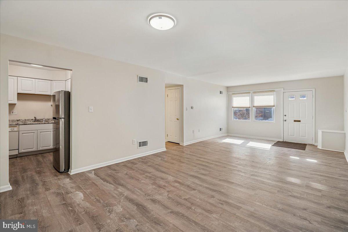 1891 Addison Road South District Heights, MD 20747 - Photo 7 of 21 Living/dining room