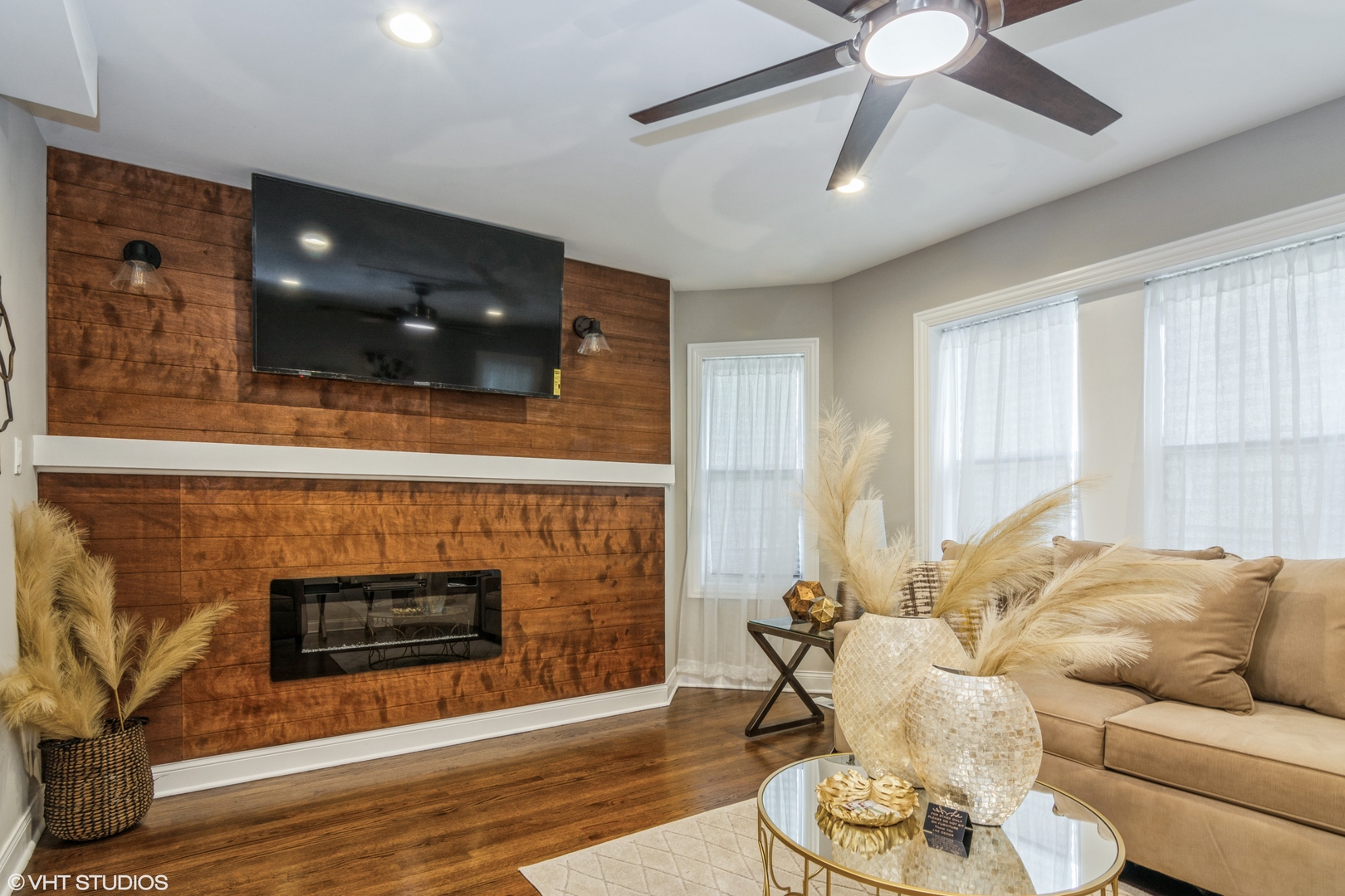 9044 South Carpenter Street Chicago, IL 60620 - Photo 2 of 14 a living room with furniture and a fireplace
