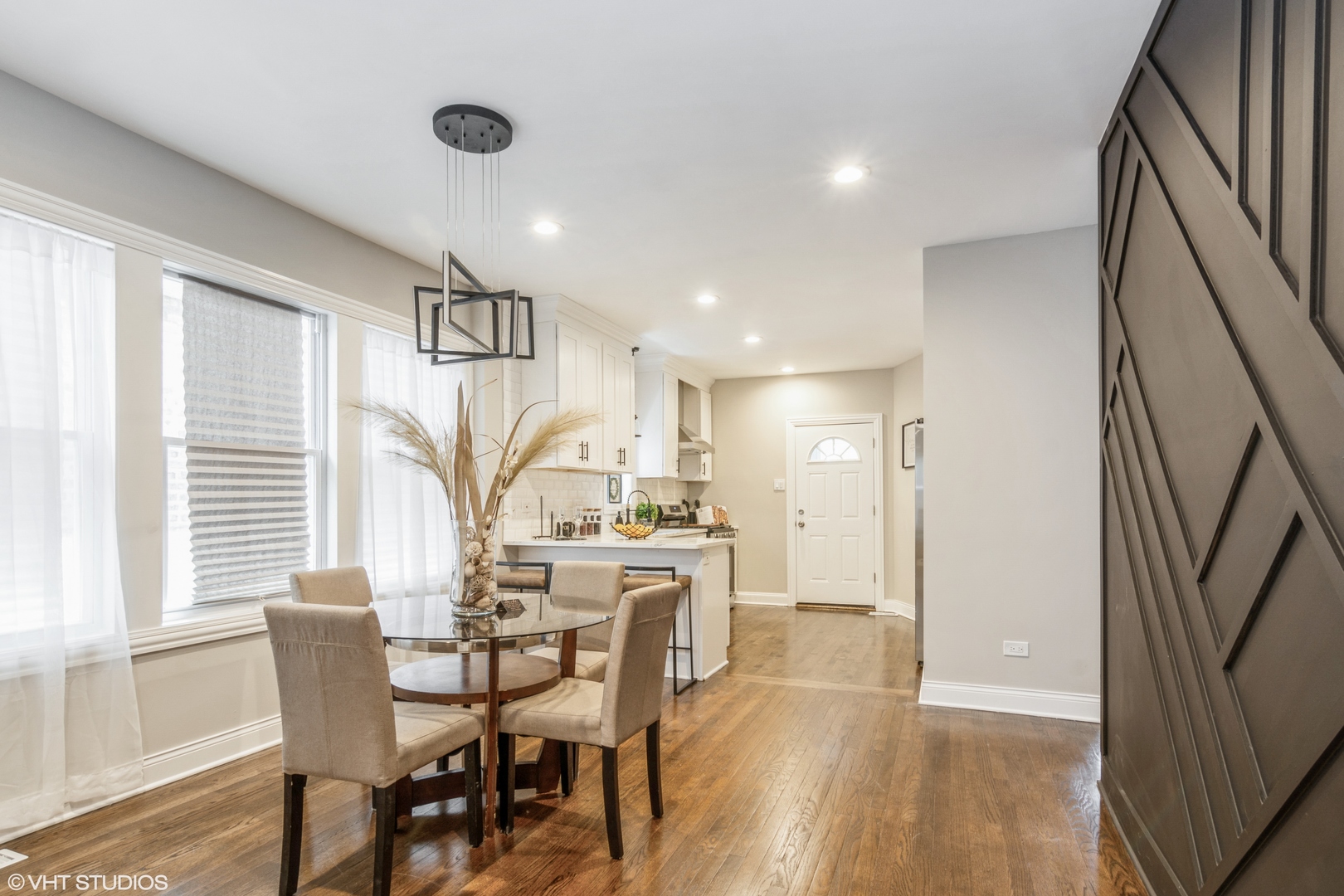 9044 South Carpenter Street Chicago, IL 60620 - Photo 4 of 14 a view of a dining room with furniture and a window
