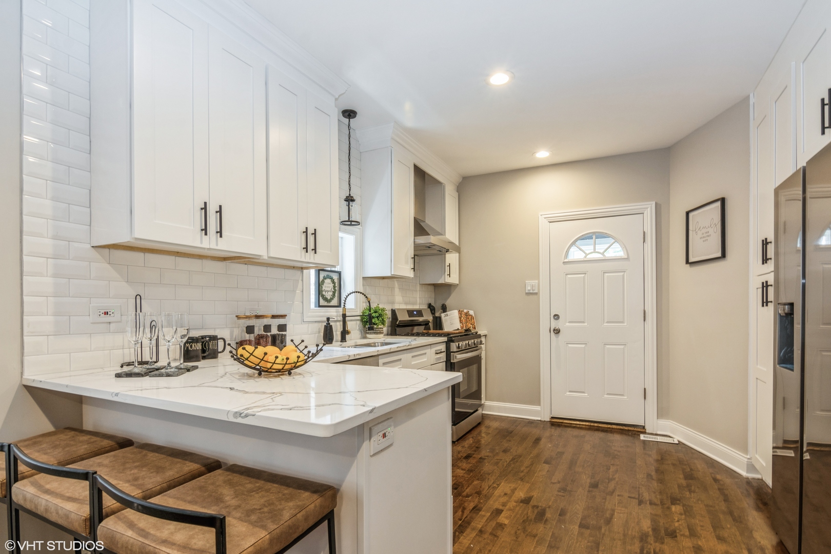 9044 South Carpenter Street Chicago, IL 60620 - Photo 7 of 14 a kitchen with a sink a stove and cabinets