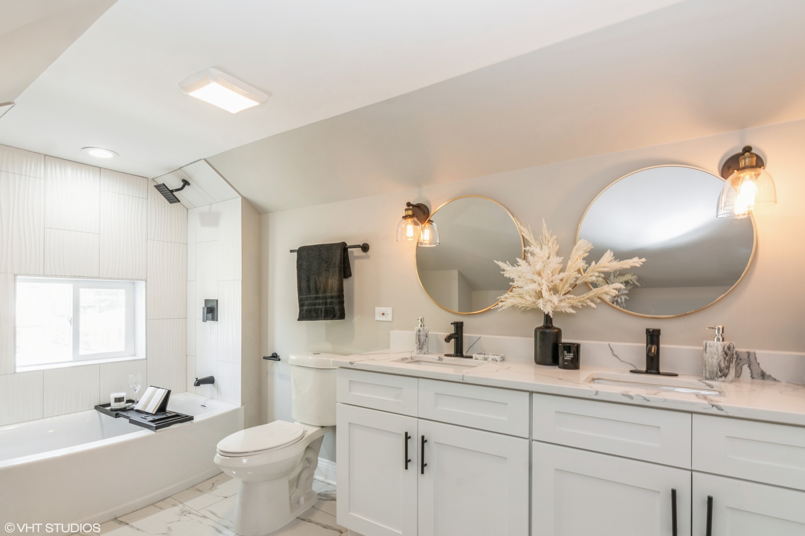 9044 South Carpenter Street Chicago, IL 60620 - Photo 10 of 14 a bathroom with a double vanity sink and a mirror