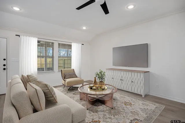 a living room with furniture and a window