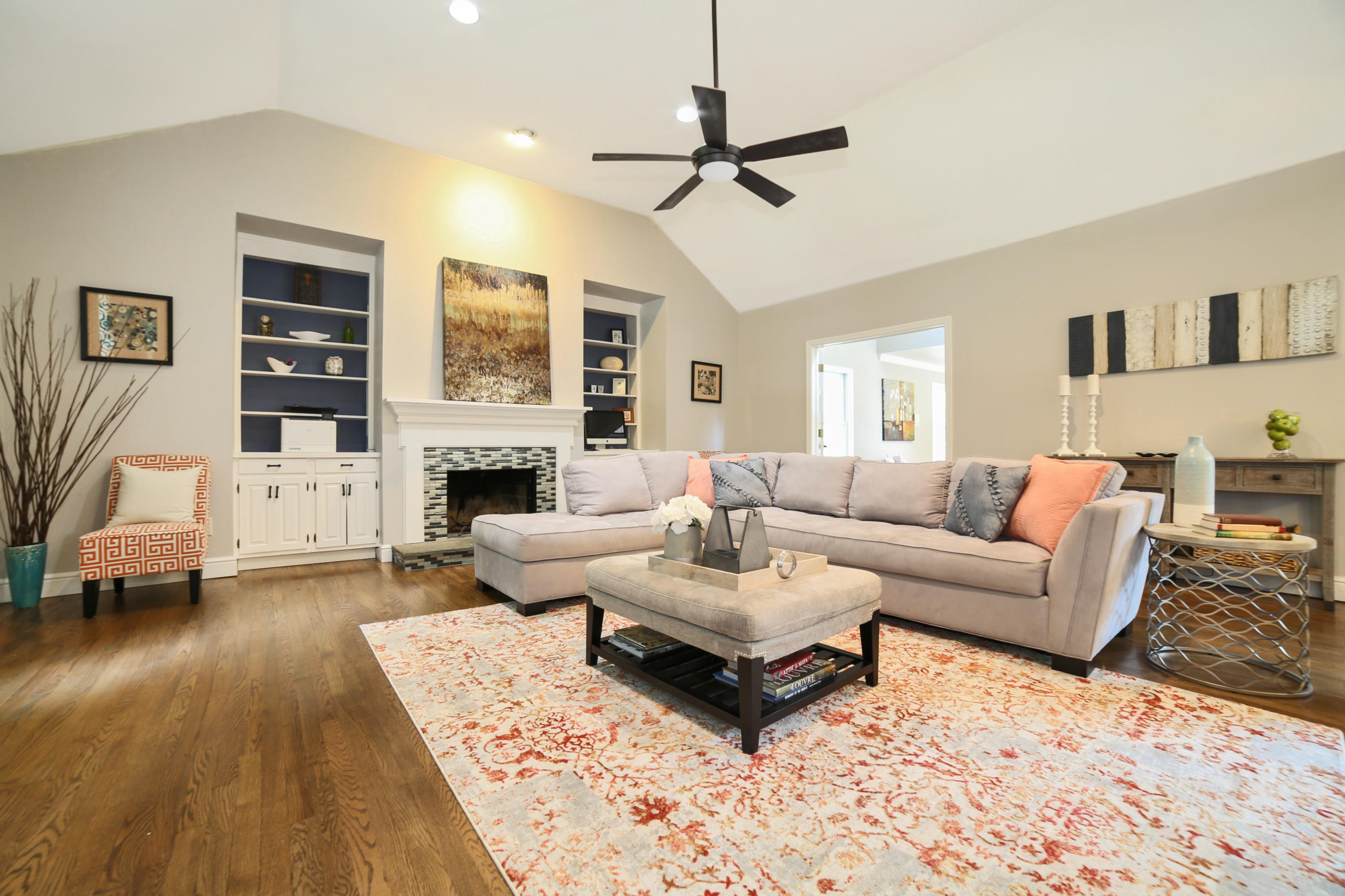 48 Hoyt Farm Road New Canaan, CT 06840 - Photo 11 of 26 a living room with furniture a fireplace and a flat screen tv