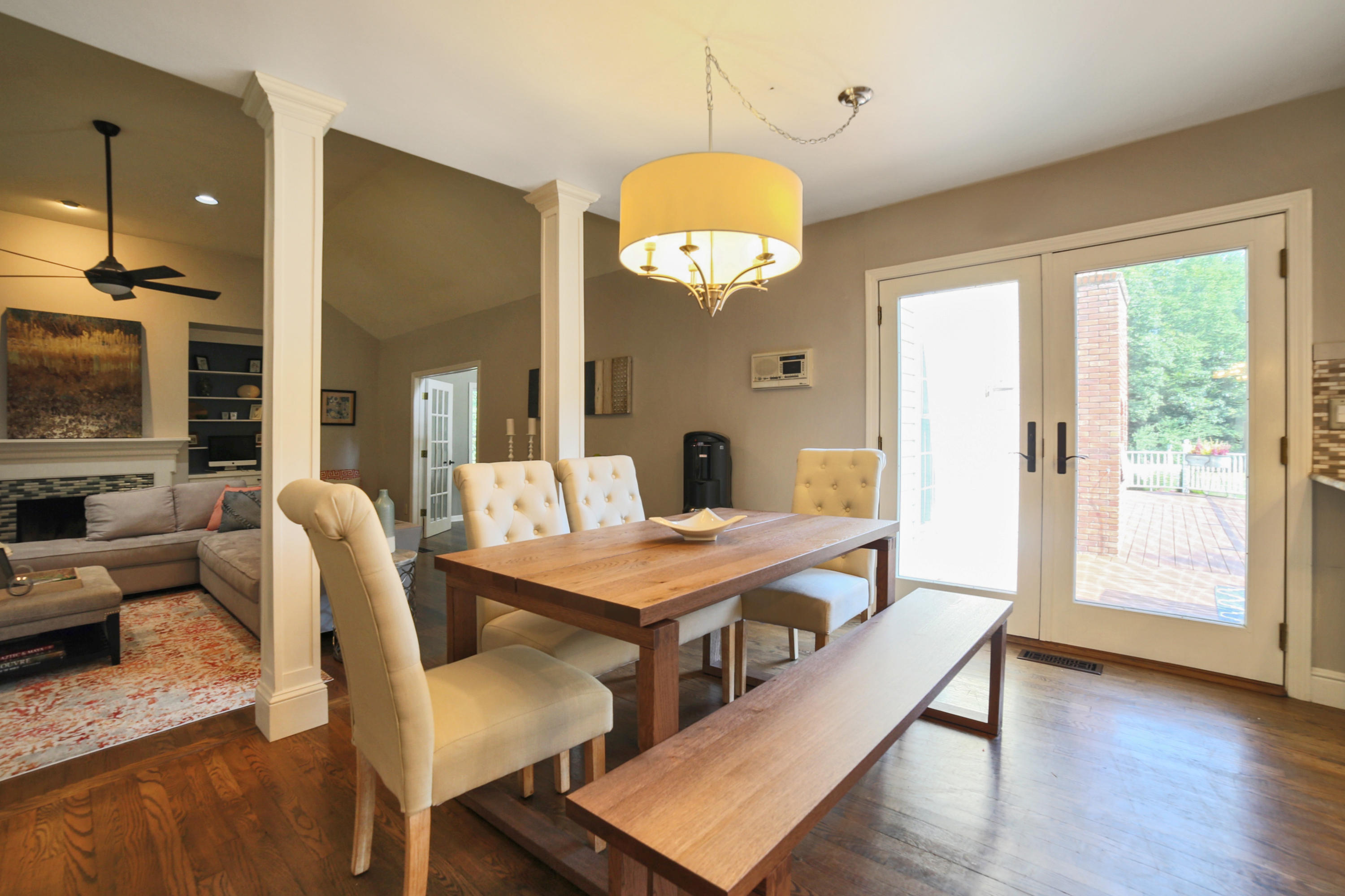 48 Hoyt Farm Road New Canaan, CT 06840 - Photo 13 of 26 a view of a dining room with furniture wooden floor and chandelier