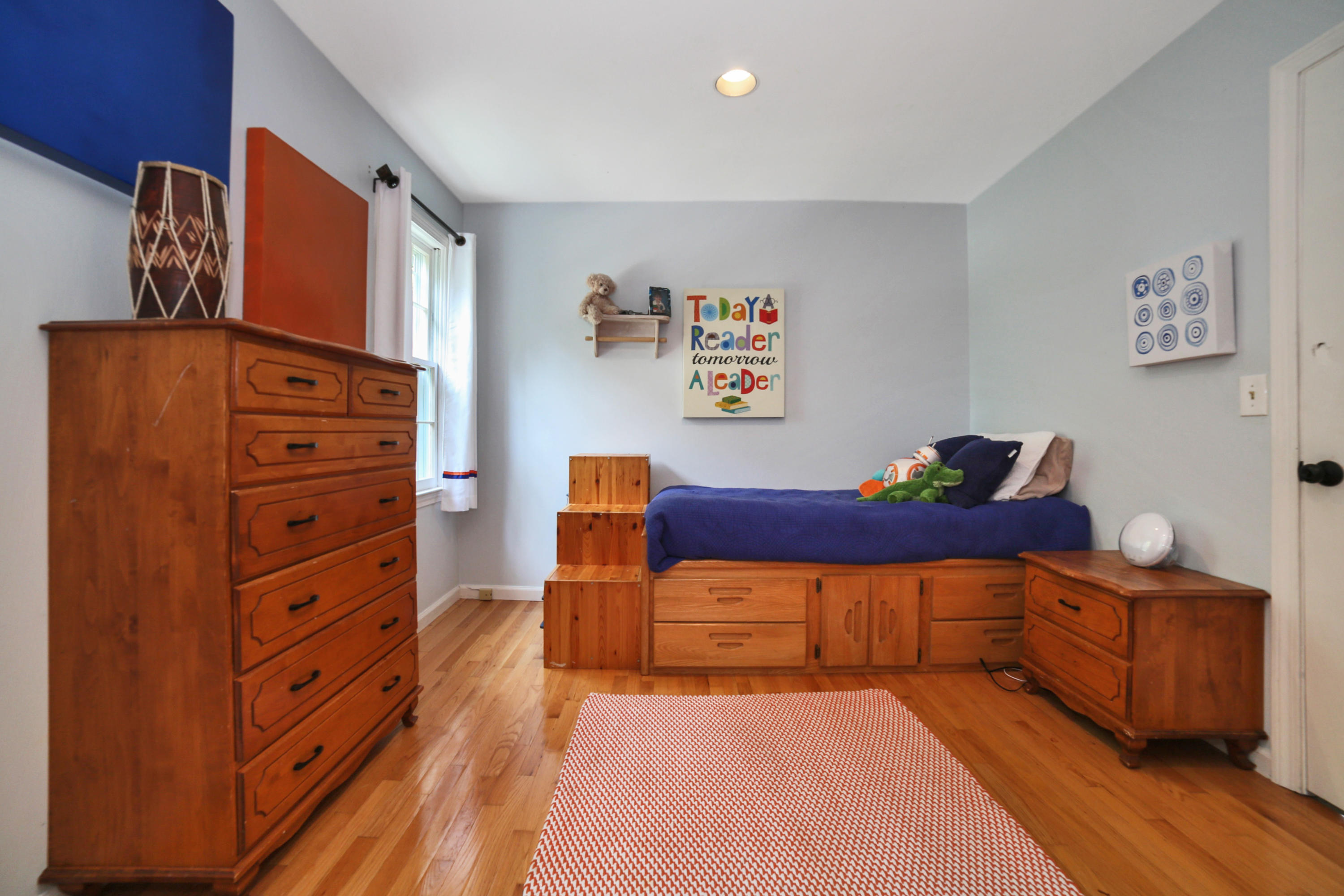 48 Hoyt Farm Road New Canaan, CT 06840 - Photo 19 of 26 a view of a bedroom with furniture and wooden floor