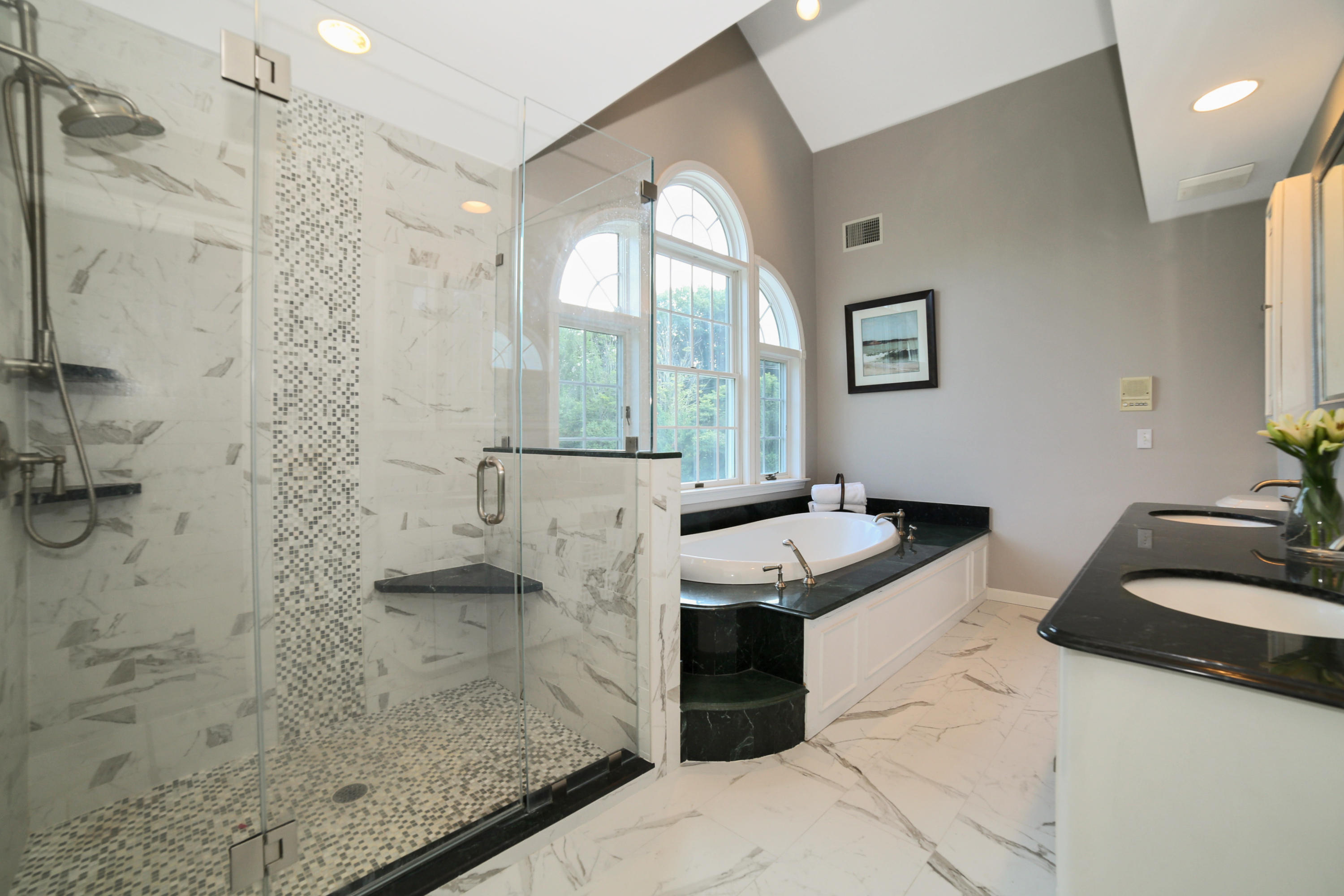 48 Hoyt Farm Road New Canaan, CT 06840 - Photo 21 of 26 a spacious bathroom with a granite countertop sink a mirror and shower