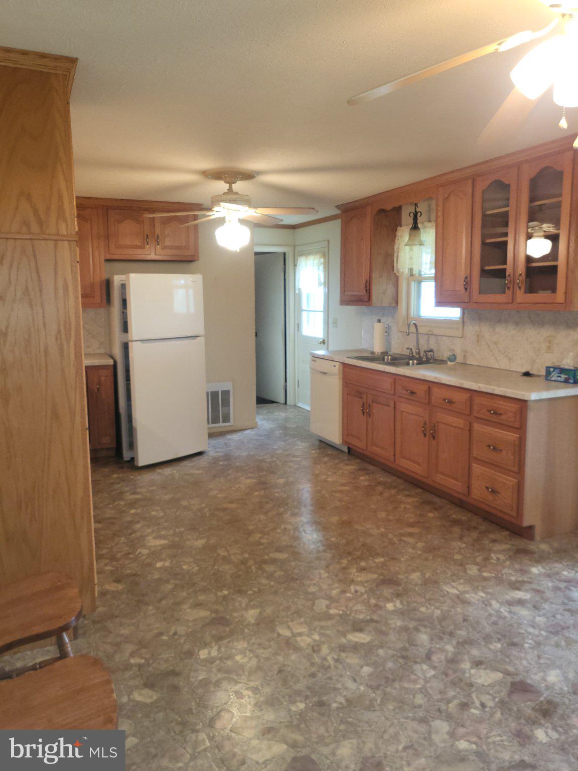 32 Sheetz Road Halifax, PA 17032 - Photo 7 of 20 a large bathroom with a granite countertop sink and a mirror