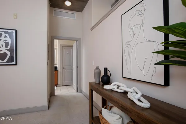 a room with furniture and wooden floor
