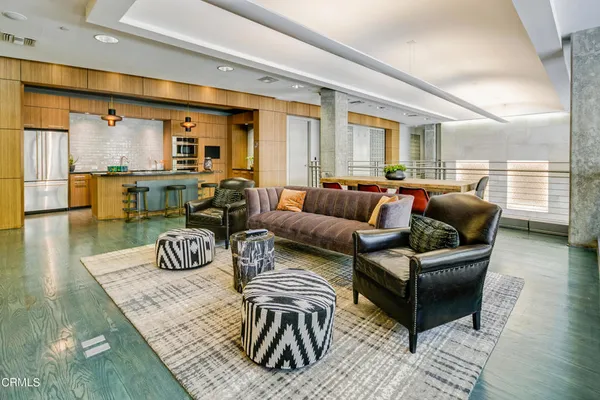 a living room with furniture and a table