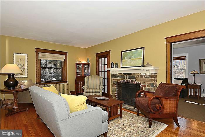 1914 Stratton Road Silver Spring, MD 20910 - Photo 2 of 13 a living room with furniture and a fireplace