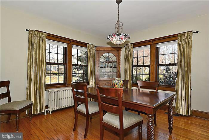 1914 Stratton Road Silver Spring, MD 20910 - Photo 3 of 13 a view of a dining room with furniture window and wooden floor