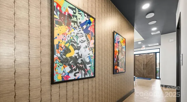a view of living room filled with furniture and window