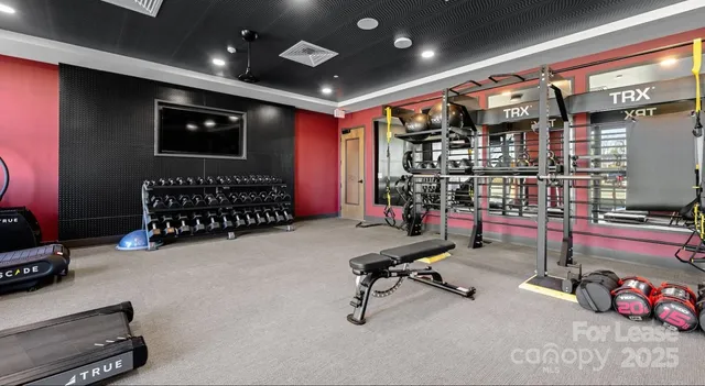 a view of a swimming pool with chairs