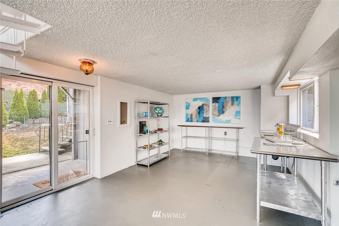 5633 Beach Drive Southwest Seattle, WA 98136 - Photo 15 of 25 a view of livingroom with furniture window and outside view