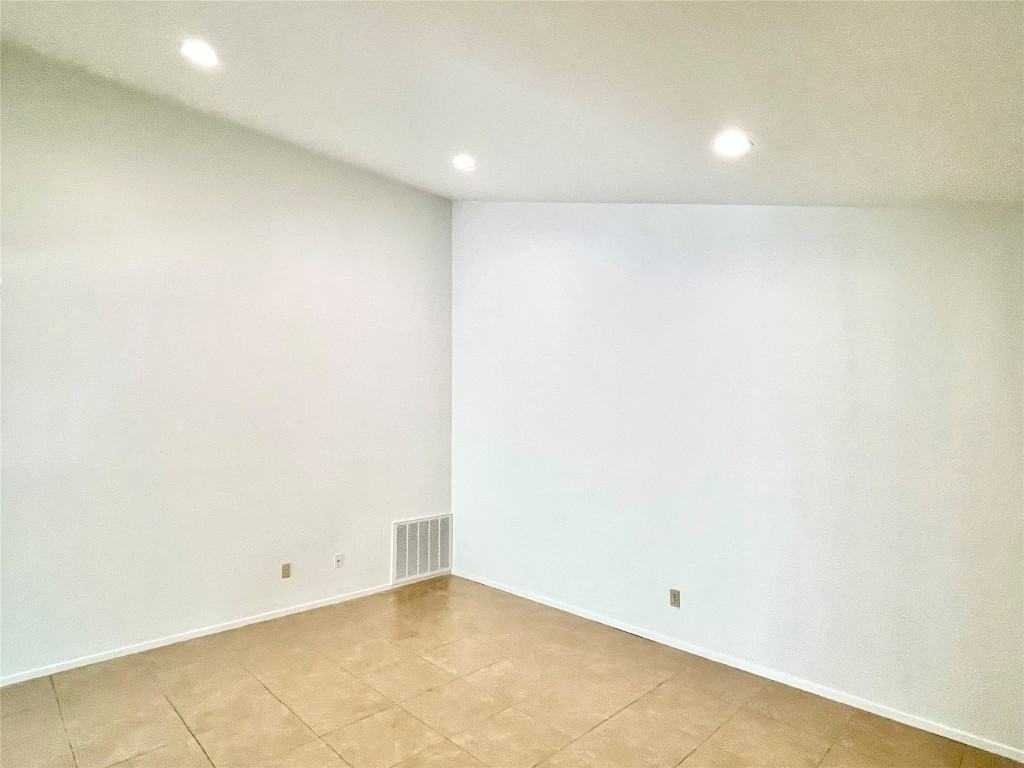 1802 Prairie Knoll Court, Unit B Austin, TX 78758 - Photo 3 of 10 a view of an empty room