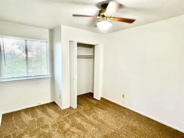 a view of empty room with a window