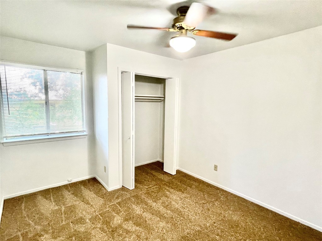 1802 Prairie Knoll Court, Unit B Austin, TX 78758 - Photo 6 of 10 a view of empty room with a window