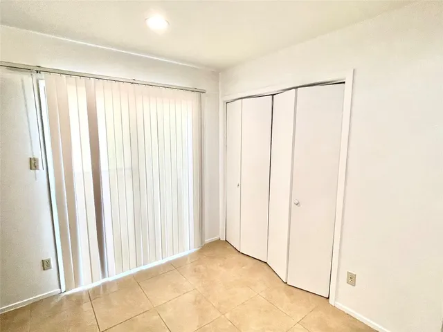 a view of a room with a window