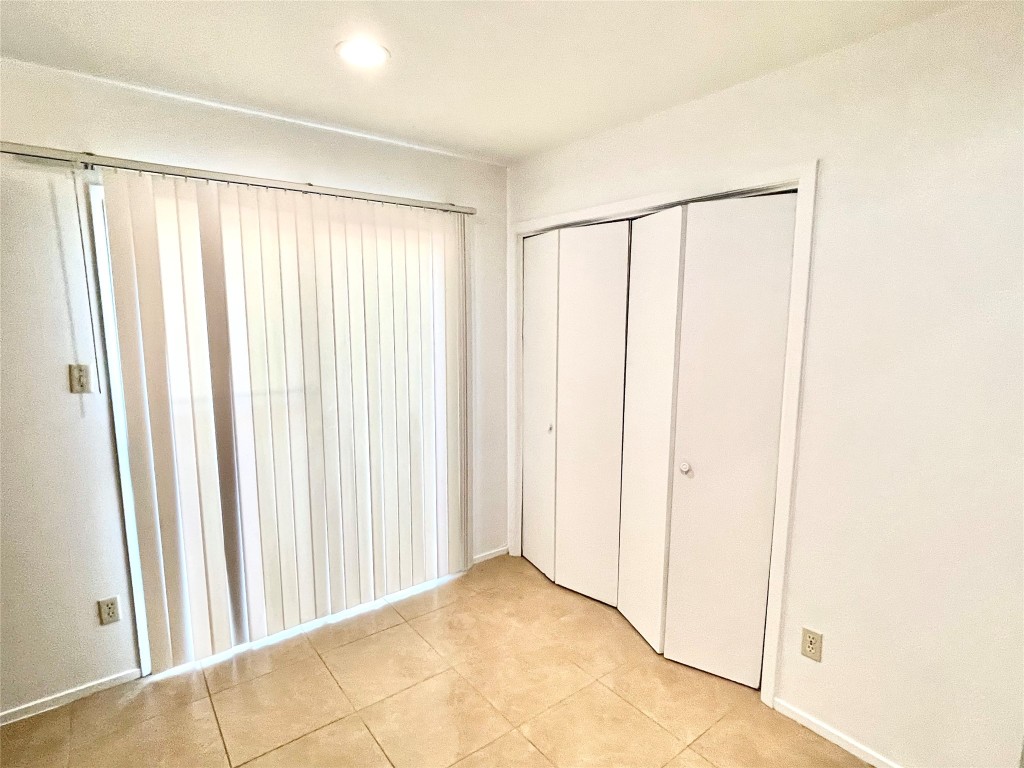 1802 Prairie Knoll Court, Unit B Austin, TX 78758 - Photo 7 of 10 a view of a room with a window