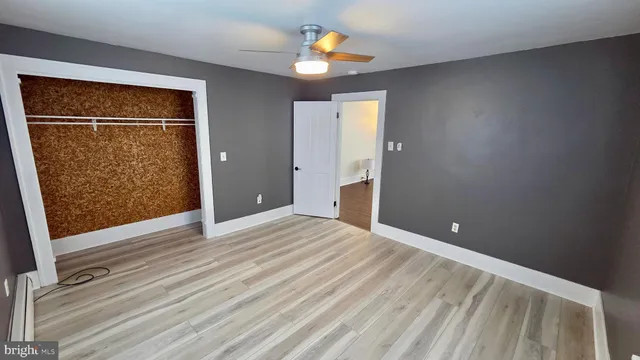 a view of entryway with wooden floor