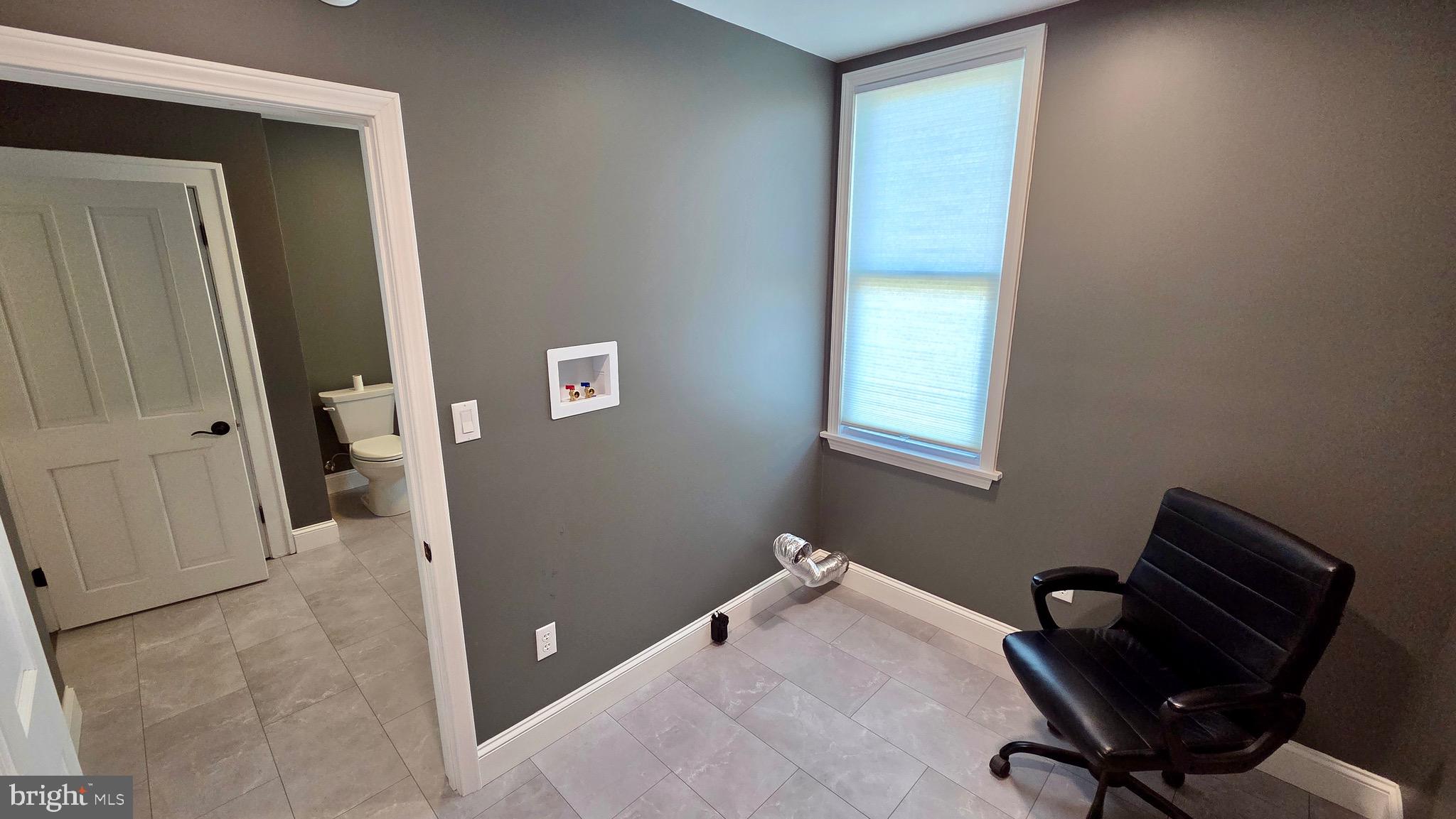 1074 Highway 103 Mount Union, PA 17066 - Photo 41 of 69 a view of a hallway with workspace and a window