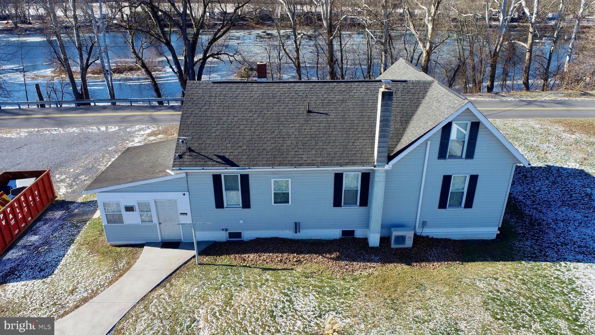 1074 Highway 103 Mount Union, PA 17066 - Photo 6 of 69 a view of a house with a wooden fence