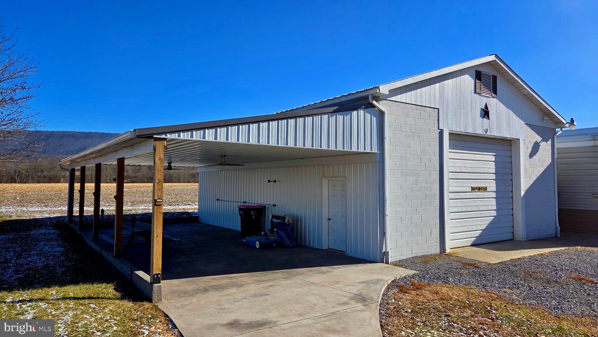 1074 Highway 103 Mount Union, PA 17066 - Photo 10 of 69 a view of a house with wooden deck