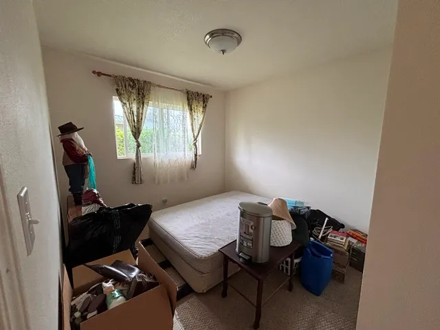 a room with furniture and a window