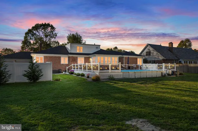 a view of a house with a big yard