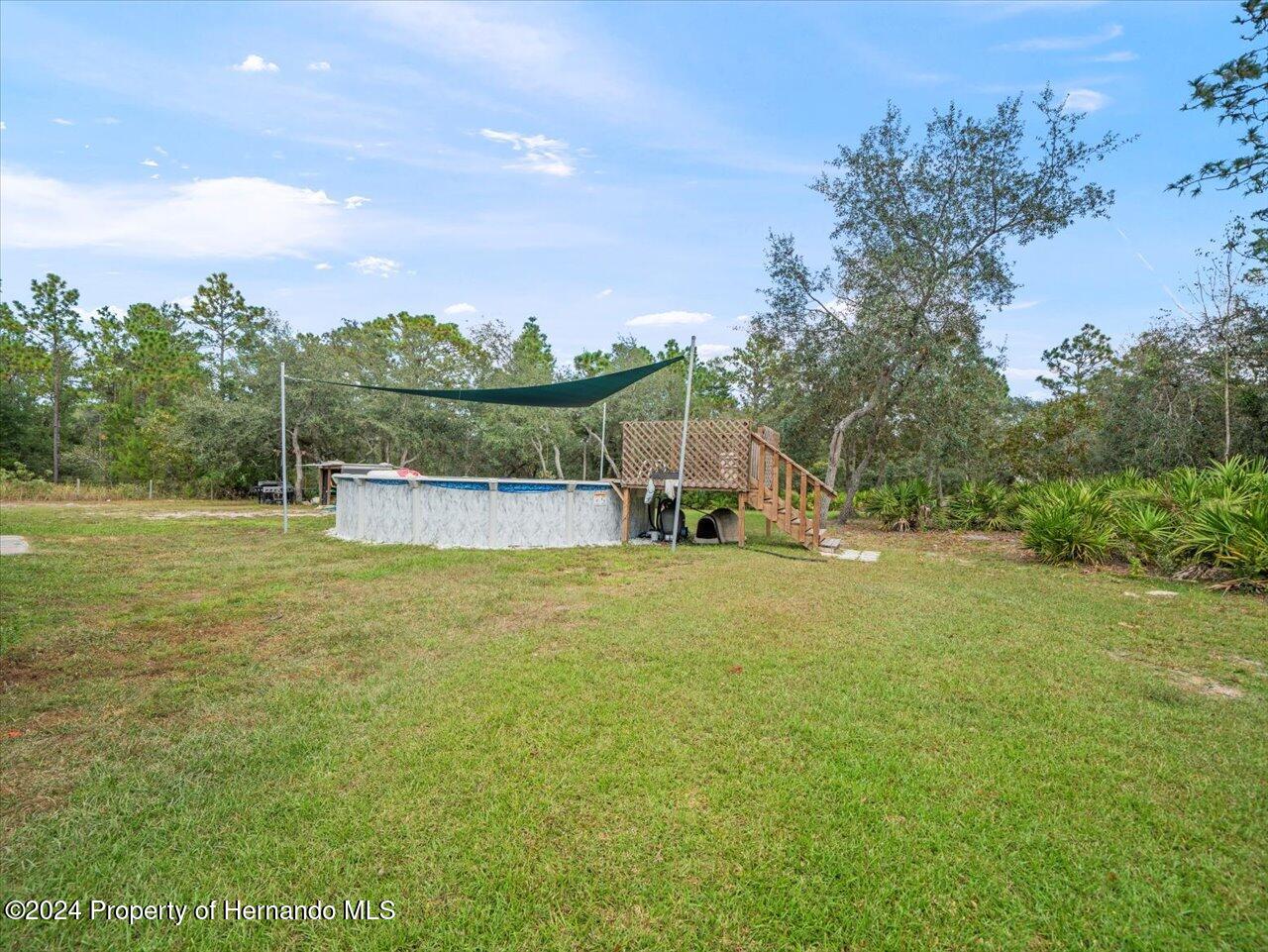 8108 Indian Trail Road Weeki Wachee, FL 34613 - Photo 49 of 59 48-Backyard