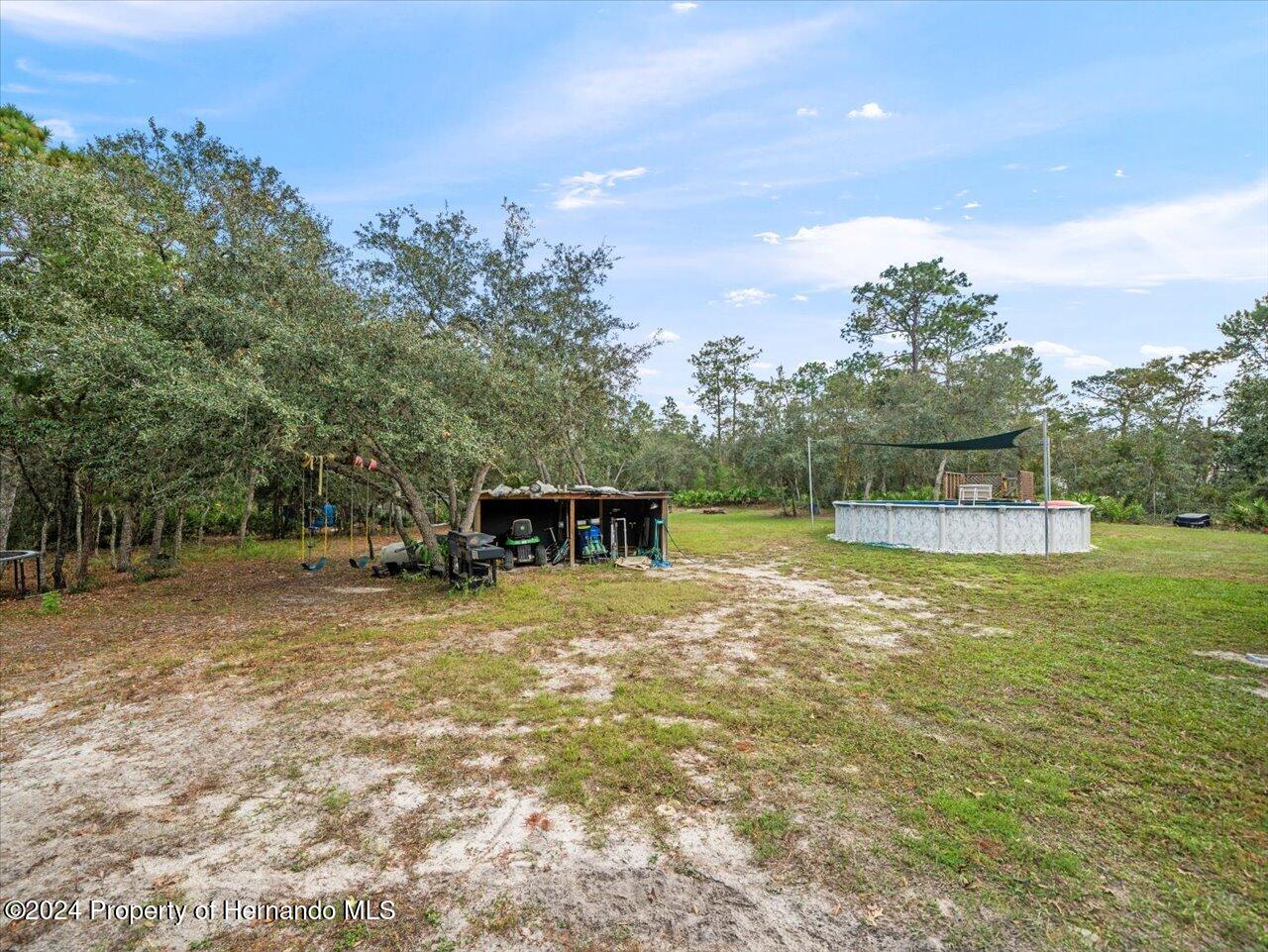 8108 Indian Trail Road Weeki Wachee, FL 34613 - Photo 50 of 59 49-Backyard