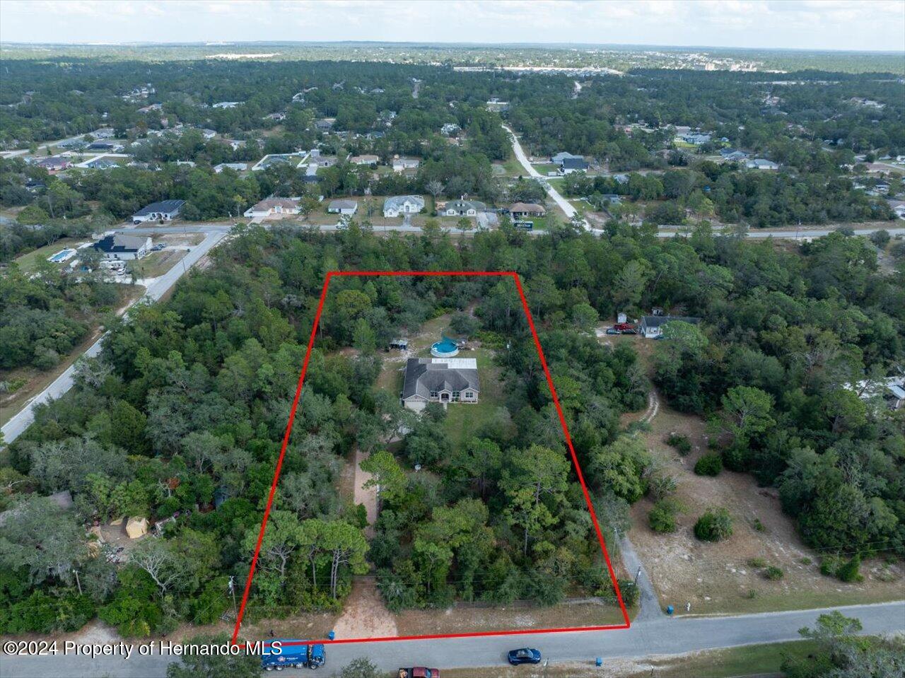 8108 Indian Trail Road Weeki Wachee, FL 34613 - Photo 6 of 59 an aerial view of forest