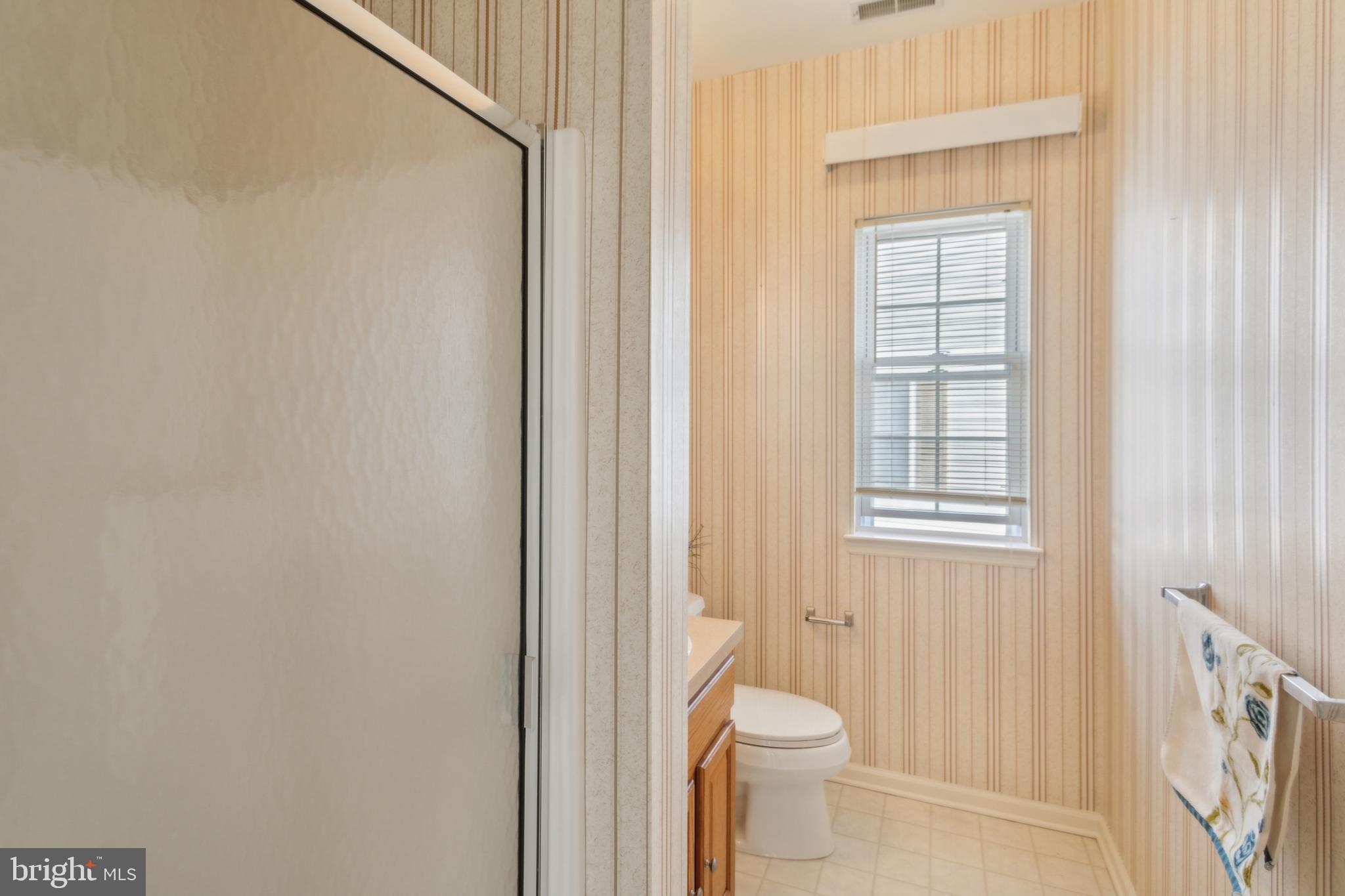 104 Trellis Lane Sewell, NJ 08080 - Photo 20 of 28 a bathroom with a toilet and a shower