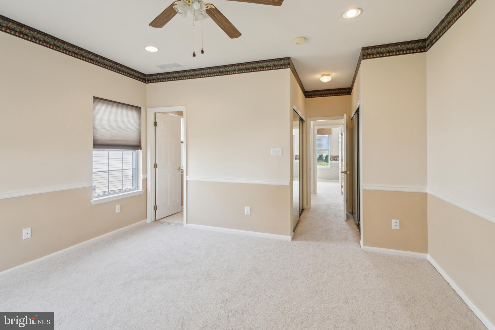 104 Trellis Lane Sewell, NJ 08080 - Photo 24 of 28 a view of empty room with a ceiling fan