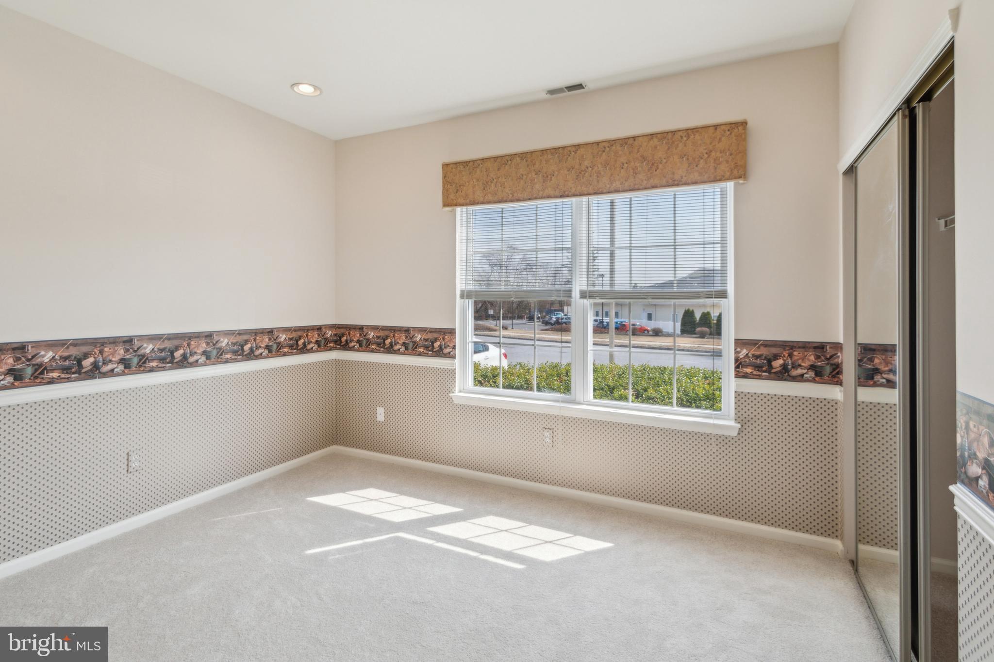 104 Trellis Lane Sewell, NJ 08080 - Photo 25 of 28 a view of an empty room with a window