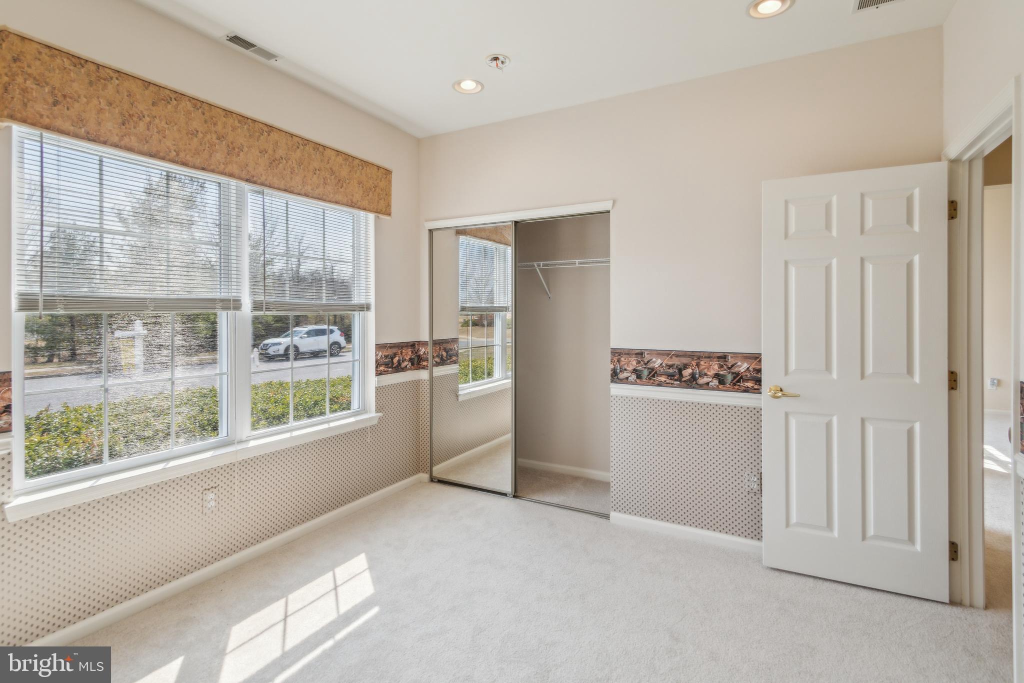 104 Trellis Lane Sewell, NJ 08080 - Photo 26 of 28 a kitchen with stainless steel appliances a refrigerator and a window