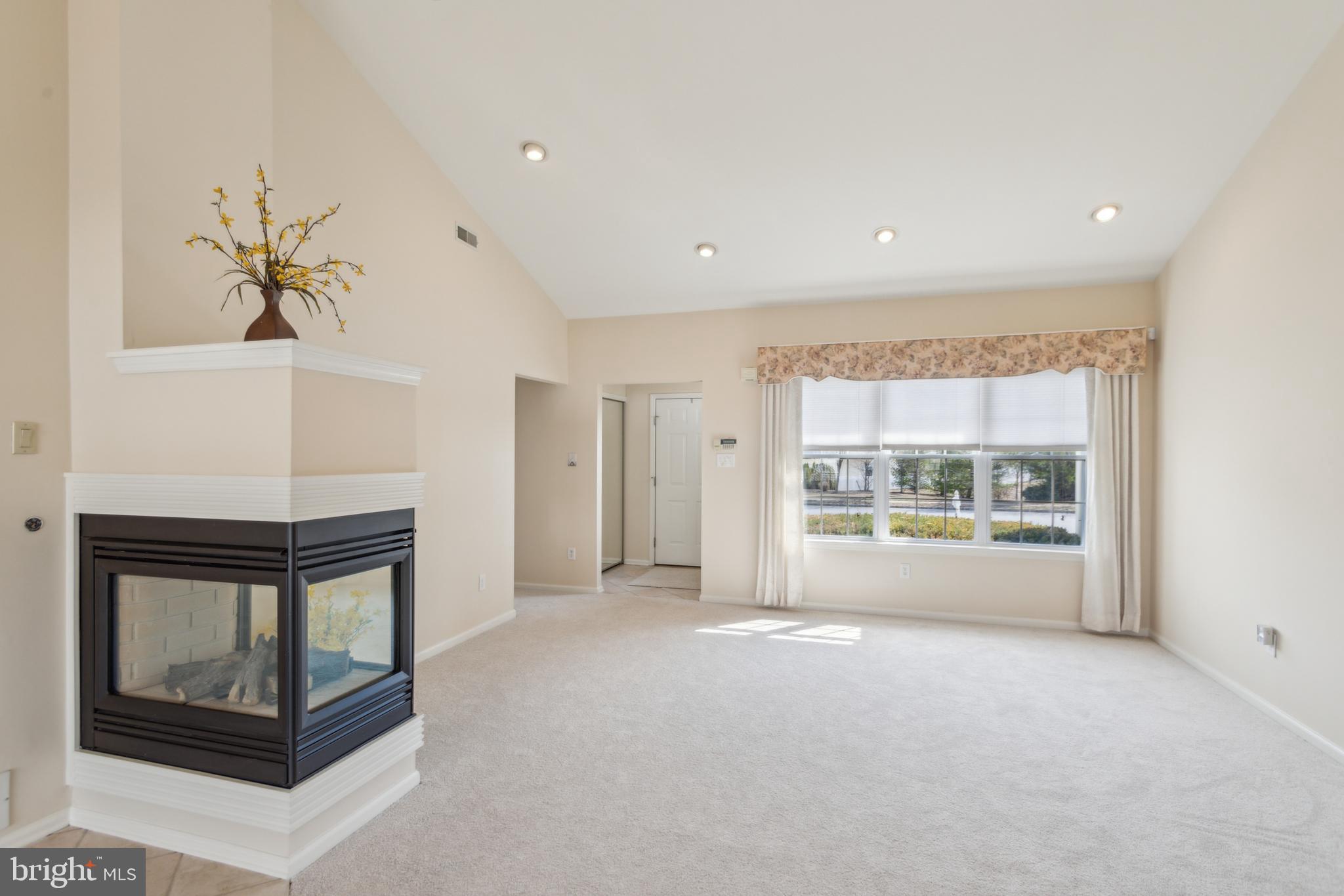 104 Trellis Lane Sewell, NJ 08080 - Photo 9 of 28 a view of an empty room with a window