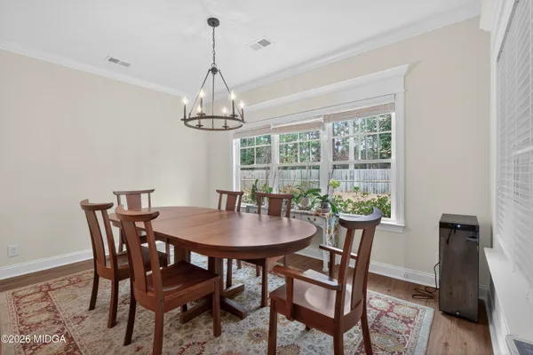 a kitchen that has a sink and a stove