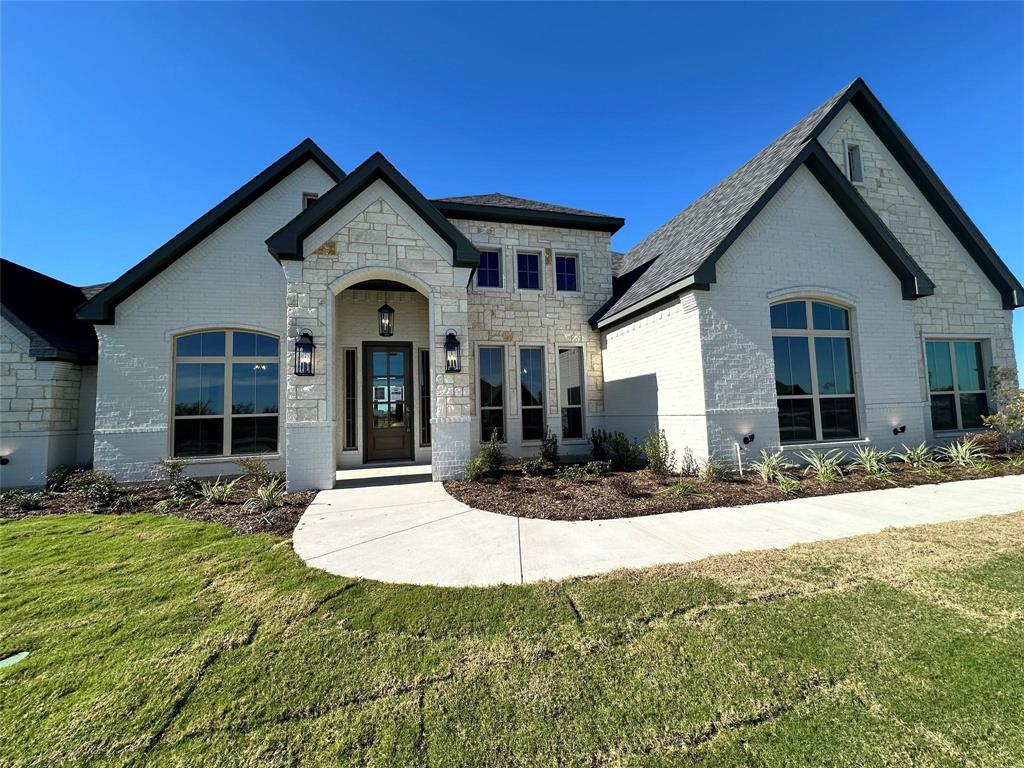 124 Blackstar Lane Decatur, TX 76234 - Photo 12 of 24 a view of a house with a yard