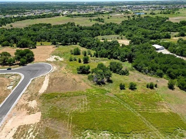 a view of a lake with a city