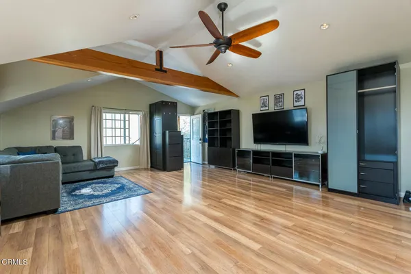 a living room with furniture and a table