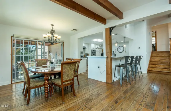 a view of a workspace with furniture and a livingroom