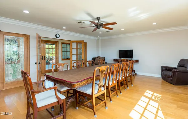 a view of a livingroom with furniture and a window