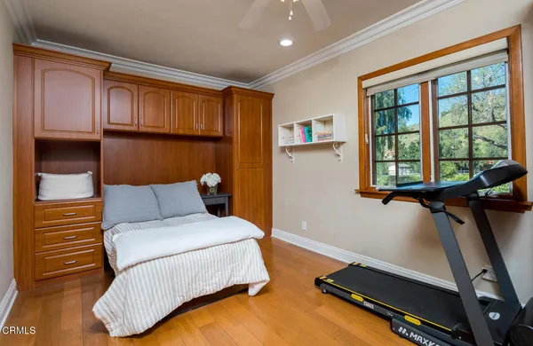 a view of a balcony with two chairs