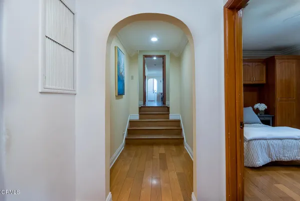 a spacious bathroom with a bathtub sink and mirror