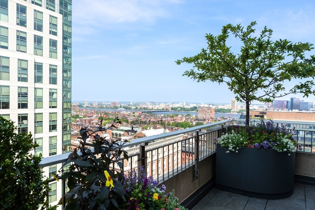 1 Huntington Avenue, Unit 1702 Boston, MA 02116 - Photo 19 of 42 a view of a balcony with furniture